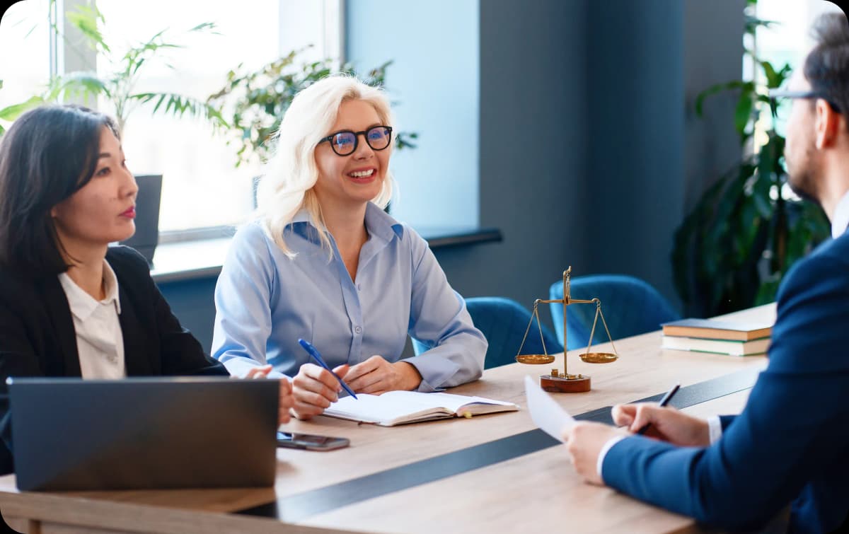 Law firm partners discussing financial strategy